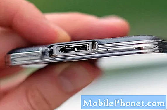 सैमसंग गैलेक्सी S5 ने चार्ज नहीं किया है, विस्मयादिबोधक चिह्न के साथ पीले त्रिकोण के साथ बैटरी दिखाता है